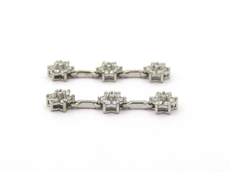 18K gold diamond drop flower earrings by Browns.