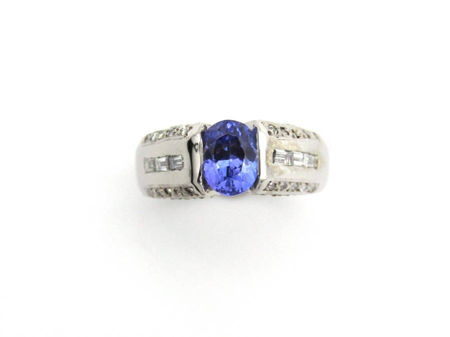 9K gold tanzanite and diamond ring.