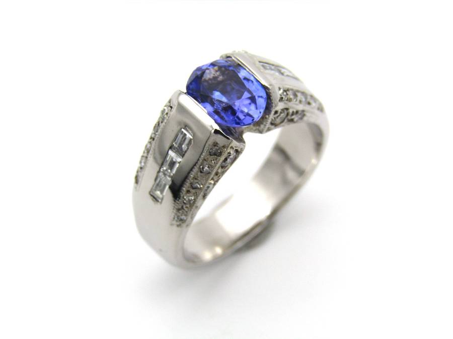 9K gold tanzanite and diamond ring.