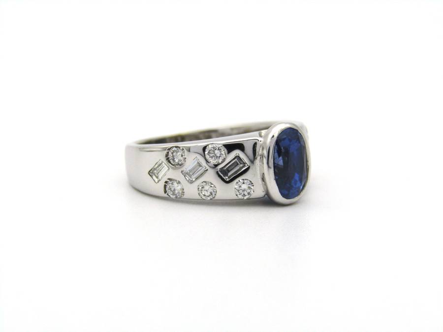 18K gold sapphire and diamond ring.