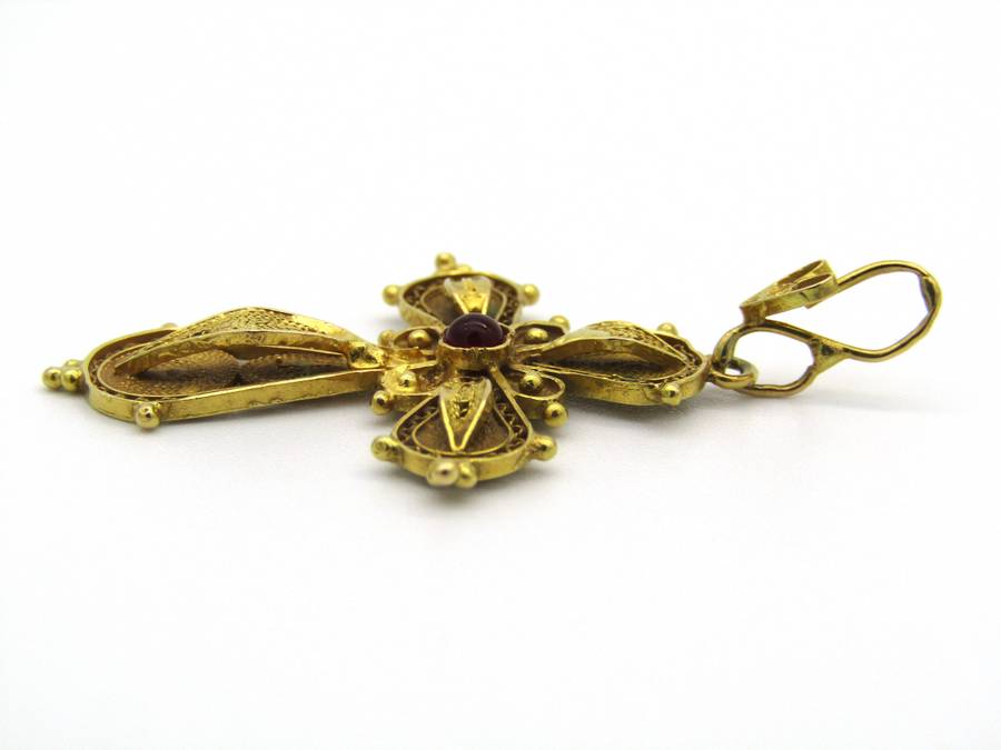 18kt gold filigree ruby cross, Circa 1940.
