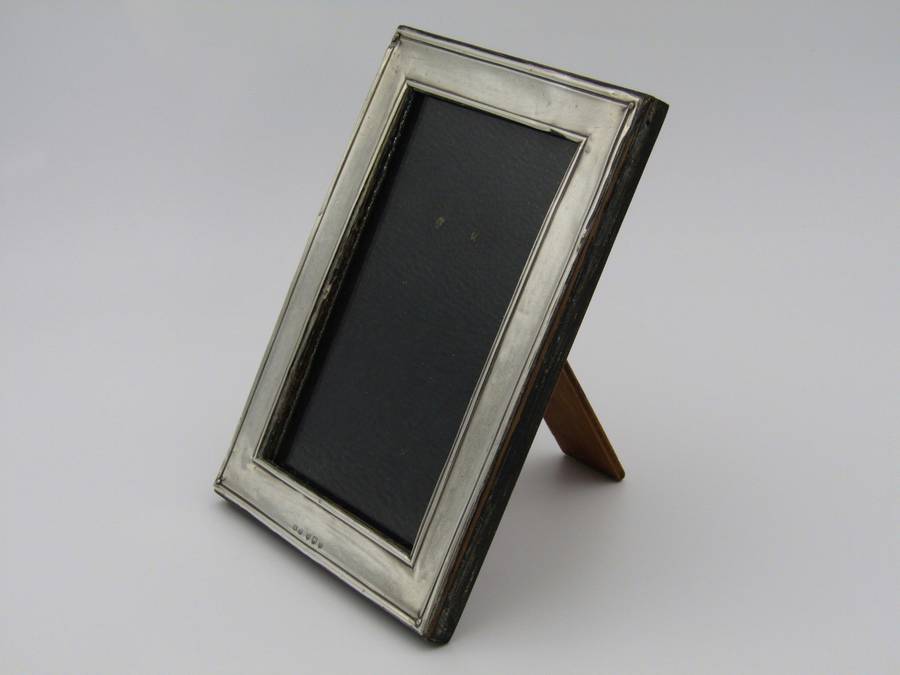A sterling silver picture frame by Henry Williamson Ltd. Birmingham, 1912.