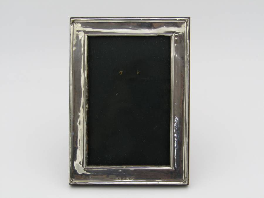 A sterling silver picture frame by Henry Williamson Ltd. Birmingham, 1912.