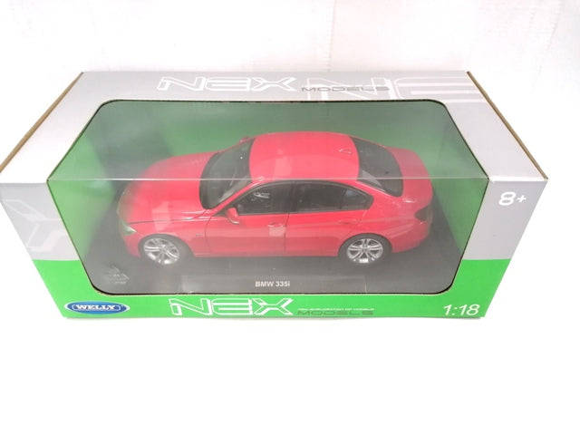 1/18 BMW 335I PREMIUM COLL. RED 2010 DIECAST