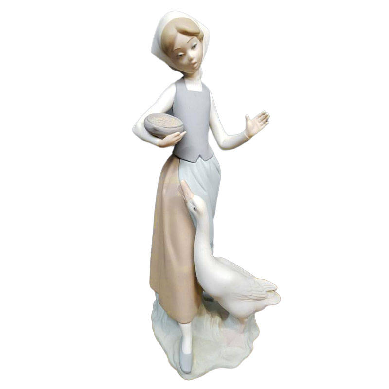 Lladro Girl Feeding Duck 1052