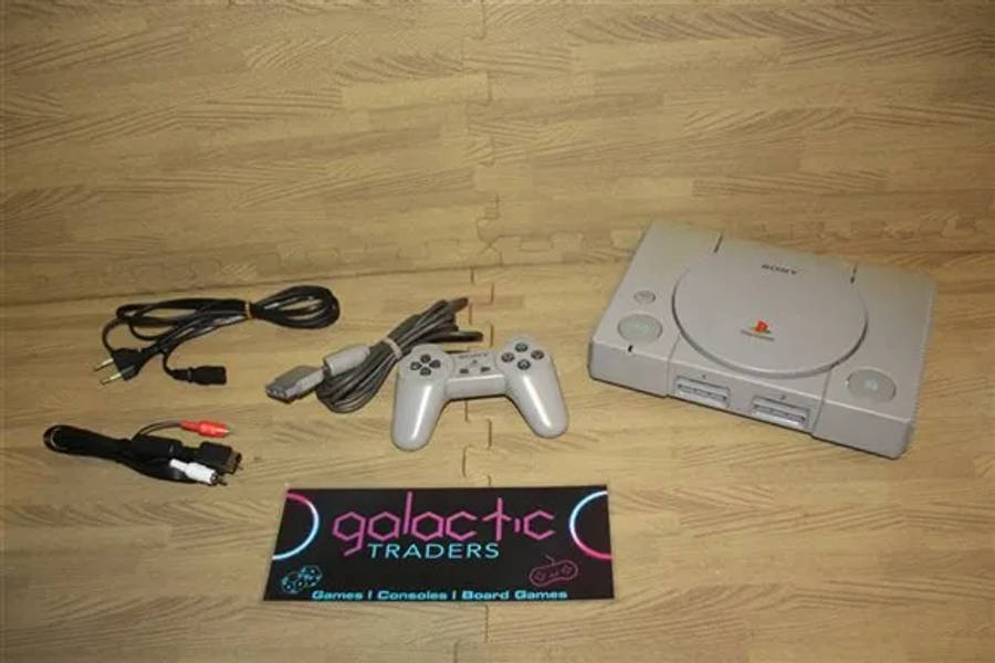 Retro PS1 Phat Console, has some discoloration due to age