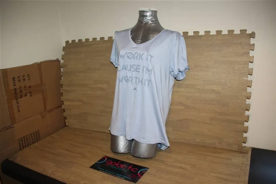 Polyester light blue shirt, Size Medium