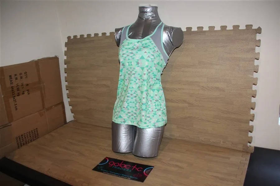 Polyester light blue patterned tanktop, Size 13-14yrs