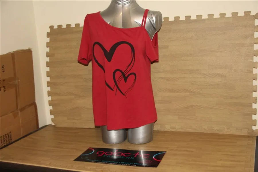 Women's red off-shoulder t-shirt with a black heart graphic print