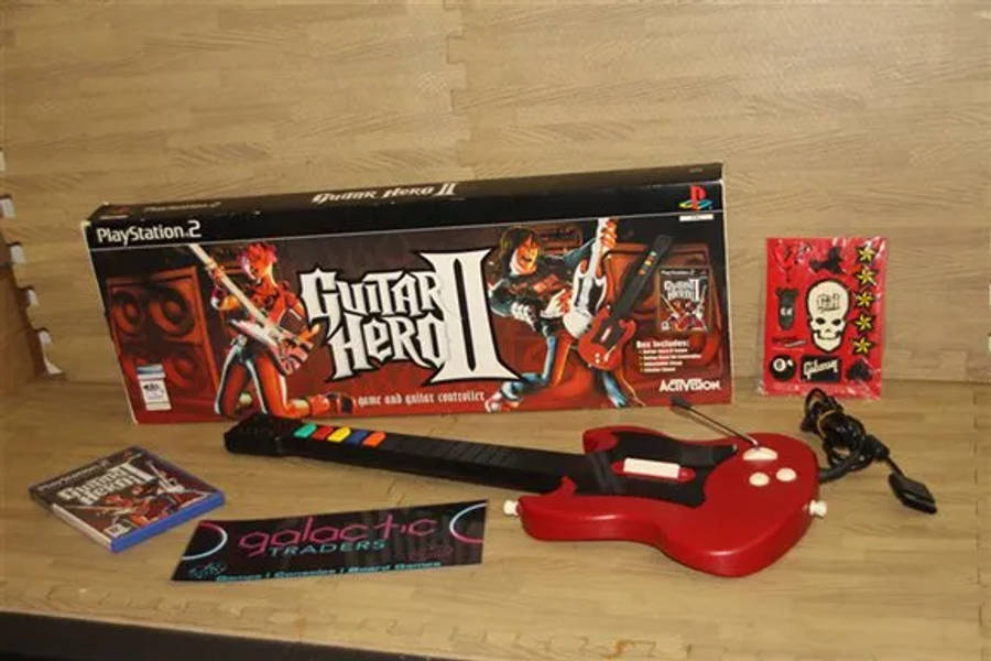 PS2 Guitar Hero guitar controller in original box with game
