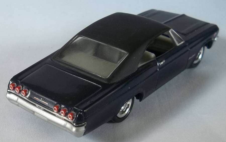 Johnny Lightning 1965 Chevrolet Impala similar scale to Matchbox car model