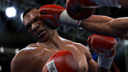 Mike Tyson taking a punch to the head from Ali in 'Fight Night Round 4'
