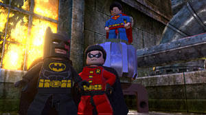 Batman, Robin and superman posing together in Lego Batman 2: DC Super Heroes