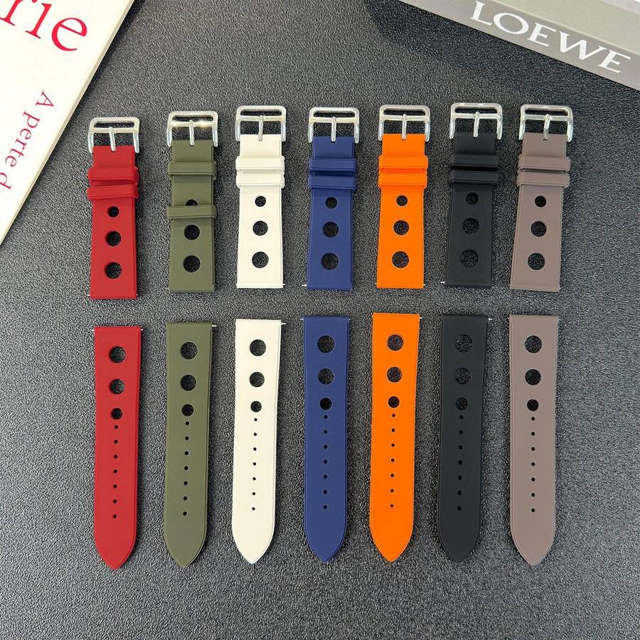 18mm Ladder Buckle Solid Color Holes Silicone Watch Band(Orange)