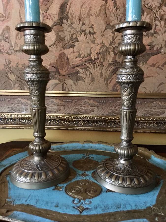 Vintage decorative candlesticks with floral design
