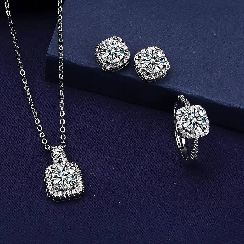 A Set Of 4 Pieces Of Necklace, Earrings, And Rings Jewelry Set