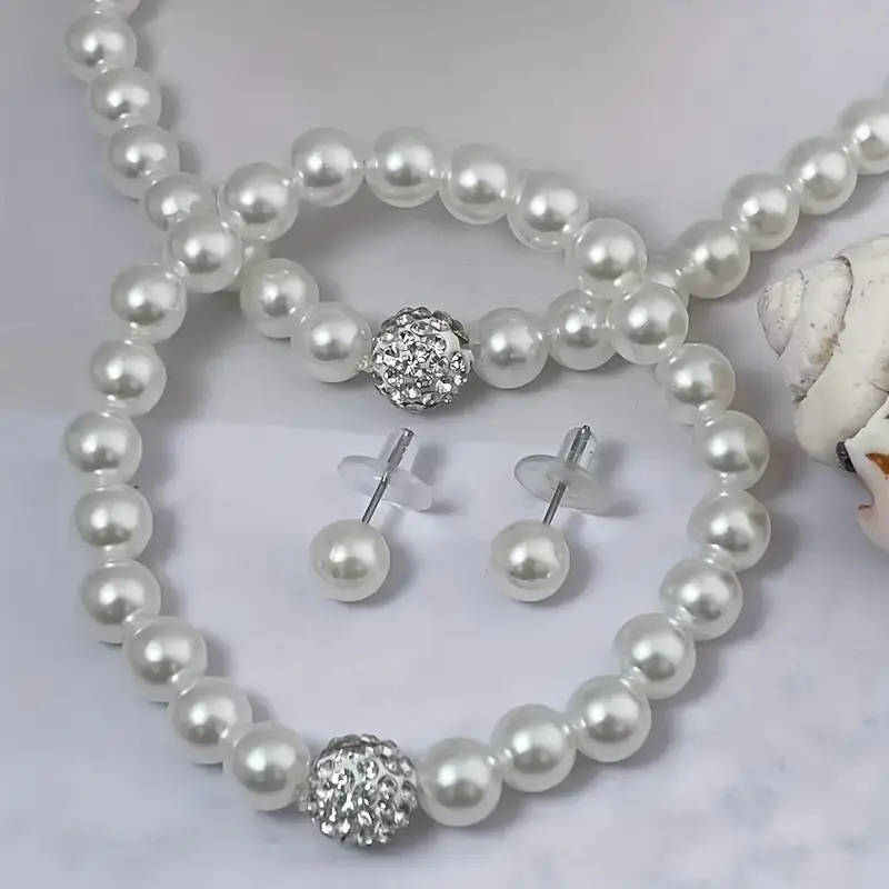 1 necklace + 1 bracelet + 2 earrings. Elegant and minimalist faux Imitation Pearl jewelry set