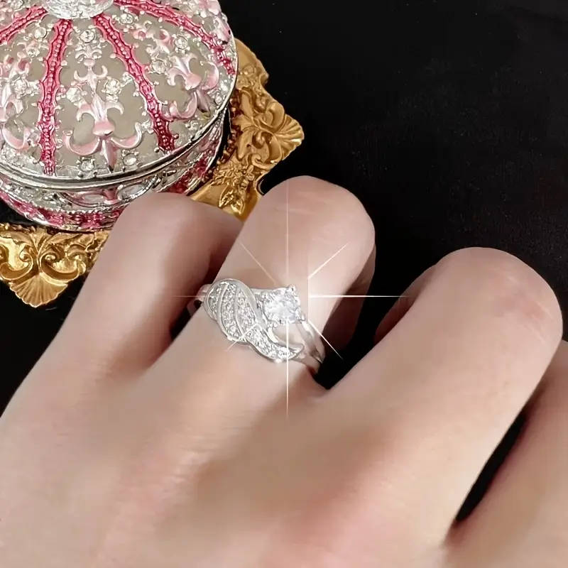 Wing shaped 925 Silver Inlaid Synthetic Zirconia Ring with adjustable size