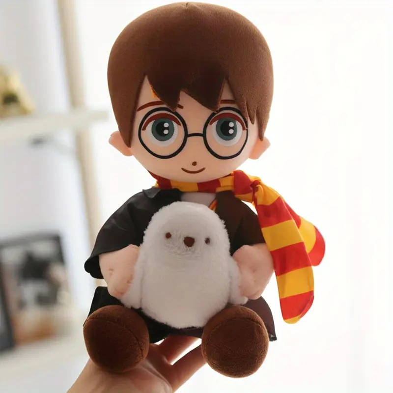 Harry Potter hugging Hedwig plush