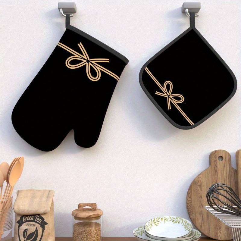 Set of 2 Heat-Resistant Oven Mitts And Pot Holders in Black Bow String Design Measuring 10.6 b