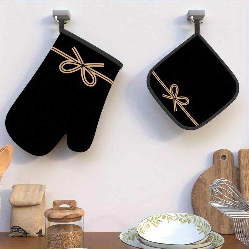 Set of 2 Heat-Resistant Oven Mitts And Pot Holders in Black Bow String Design Measuring 10.6 b