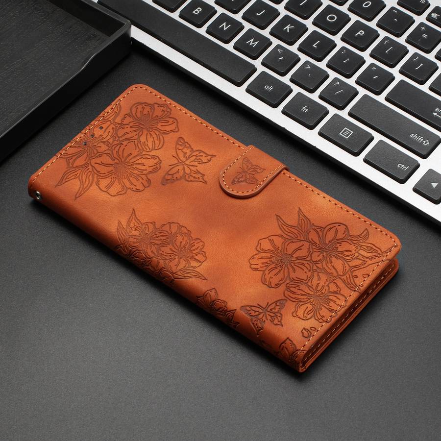 For Google Pixel 7a Cherry Blossom Butterfly Skin Feel Embossed PU Phone Case(Brown)
