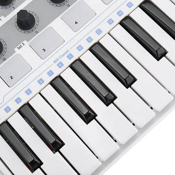 Worlde Professional 25-Key MIDI Keyboard Controller USB MIDI Drum Pad and Ultra-Portable Mini MIDI C