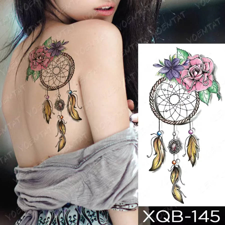 Dreamcatcher Delight - Whimsical Female Back Tattoo