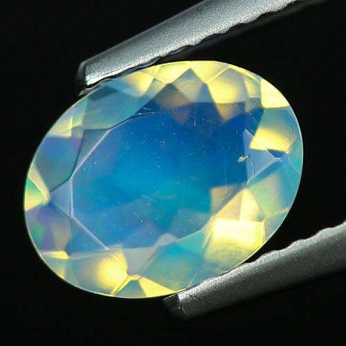 0.68 CT OVAL FACET ETHIOPIAN CRYSTA L OPAL