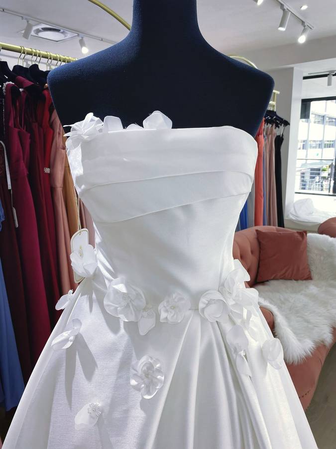 Beyonce, boob-tube mikado ballgown wedding dress.