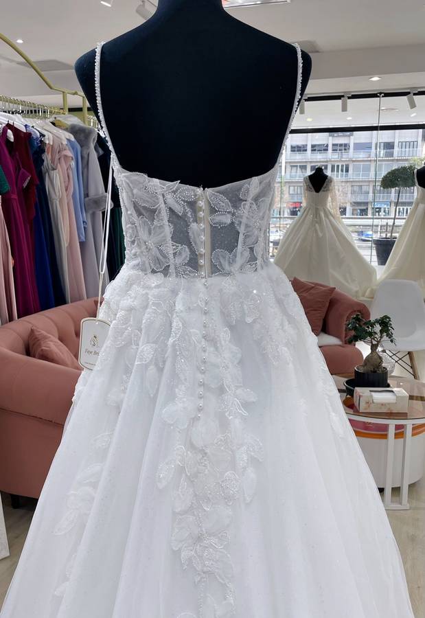 Vivienne, Tulle A-line with pearl detail.