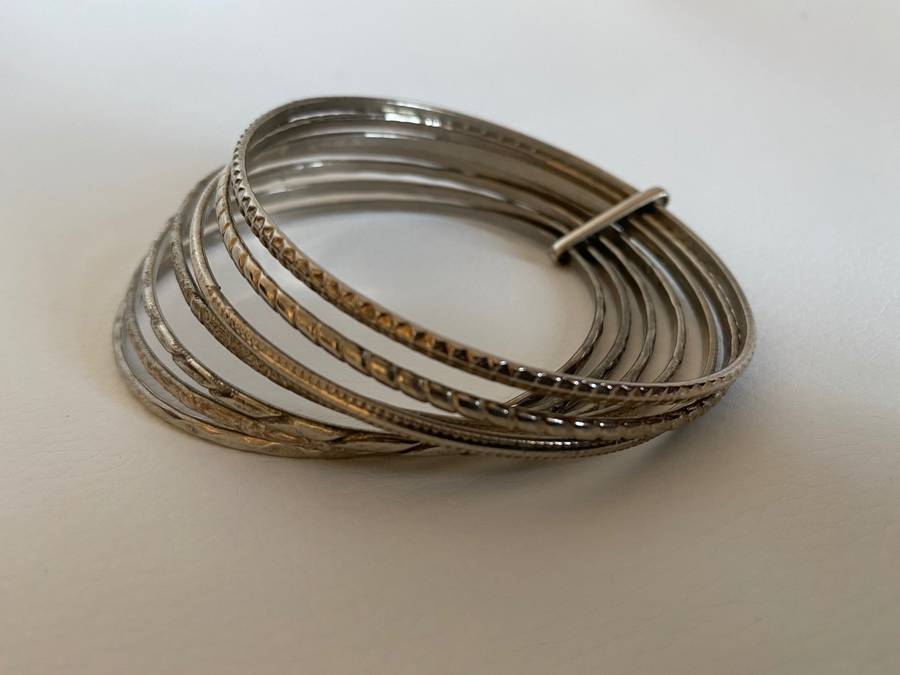 7 x Silver Plated Bangles(Connected) - Self Patterned #ML610 R79.00 | Dimensions: 60.8mm (D)