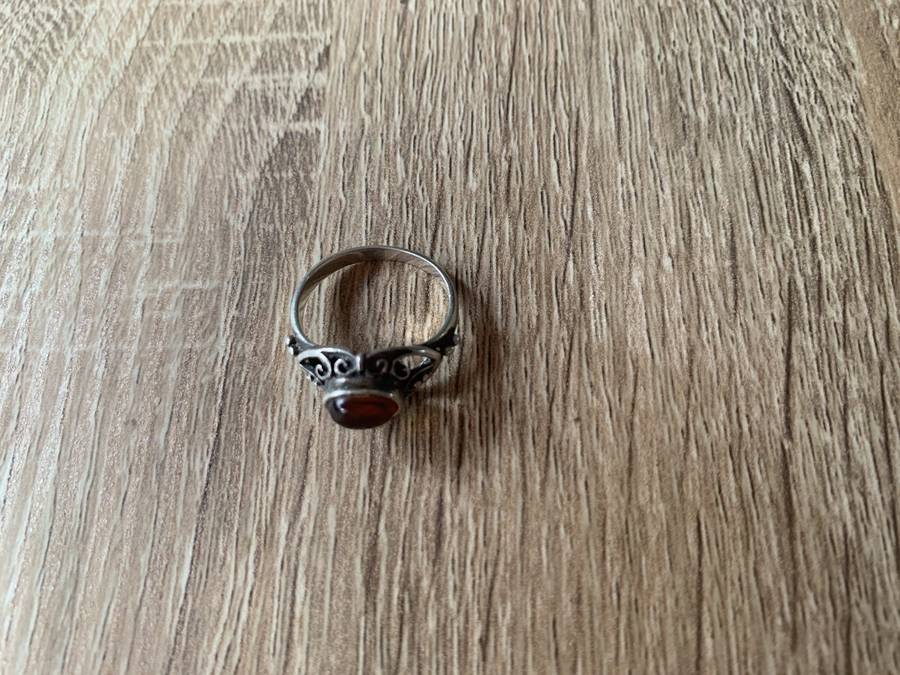 925 Silver Ring With Orange Stone On Raised Setting Surrounded By Swirls #ML700R195.00 | Dimensi...