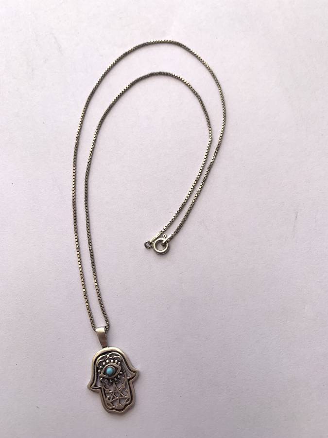 925 Silver Chamsa Pendant on Silver Chain. Chamsa has Blue Stone Inset #ML722 R395.00 | Dimension...