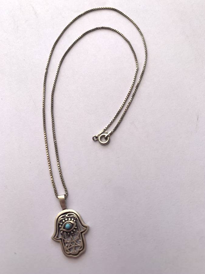 925 Silver Chamsa Pendant on Silver Chain. Chamsa has Blue Stone Inset #ML722 R395.00 | Dimension...