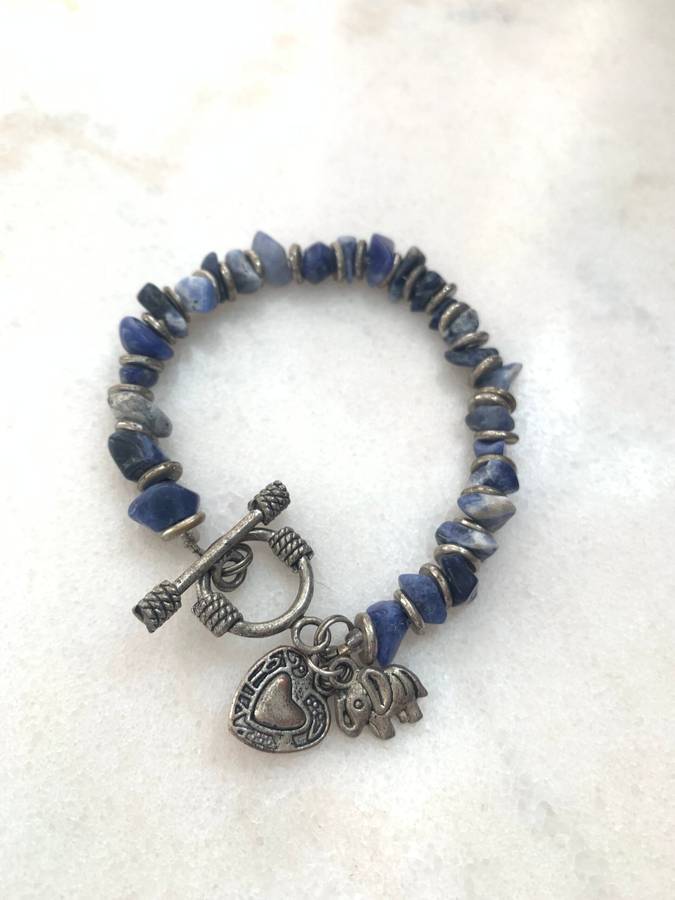 Bracelet With Irregular Shaped Blue Stones Split By Silver Coloured Round Beads With Pretty Clasp...