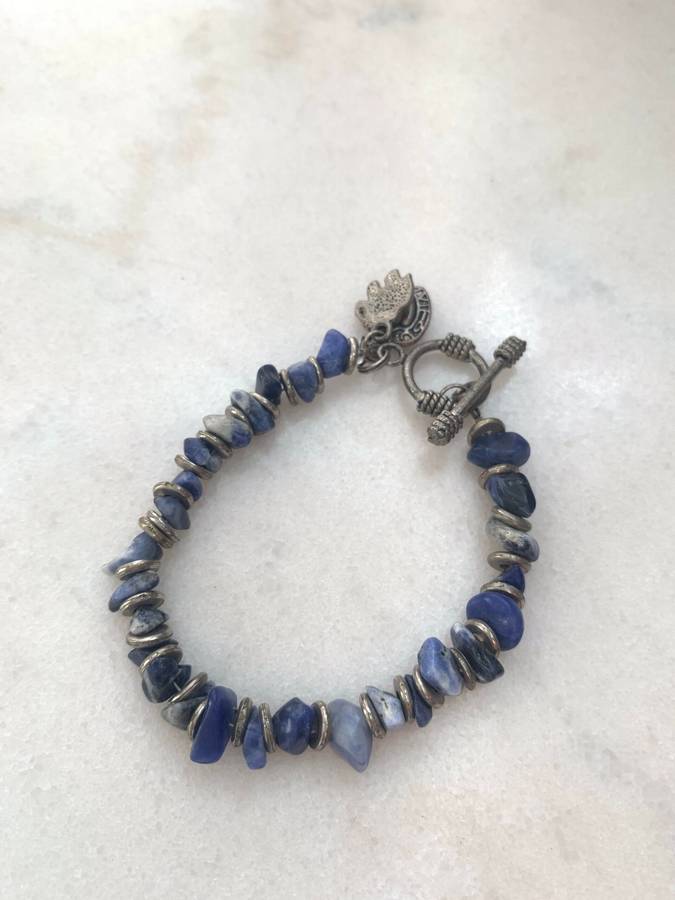 Bracelet With Irregular Shaped Blue Stones Split By Silver Coloured Round Beads With Pretty Clasp...