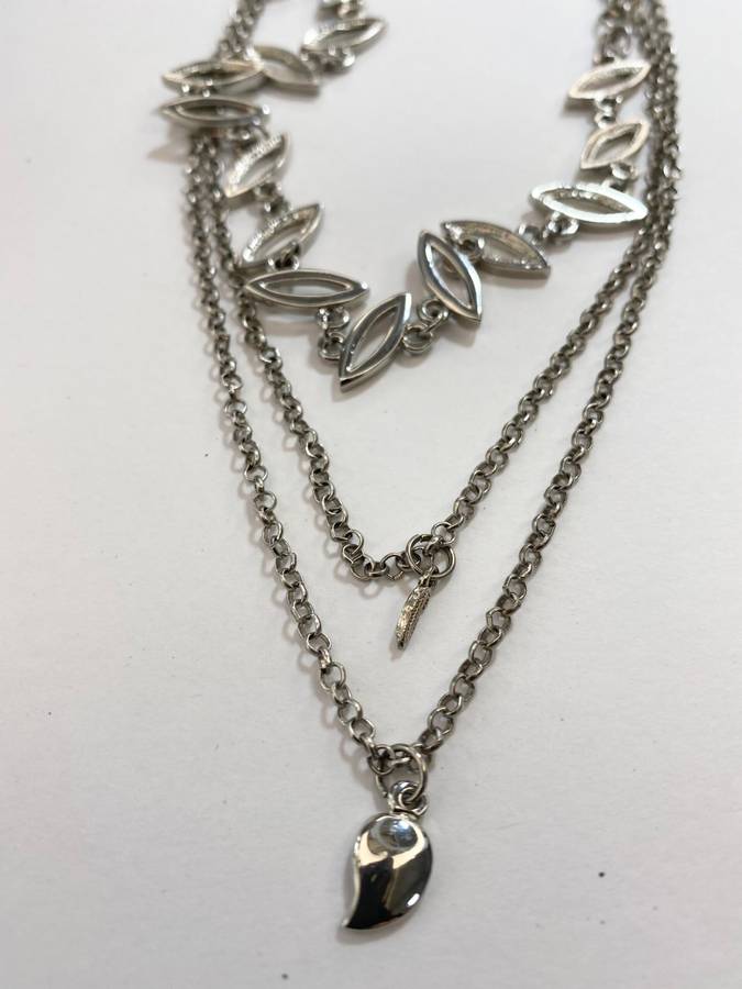 Necklace -  Silver Colour Triple Strand Necklace. Oval Links, leaf and diamante pendant, small le...