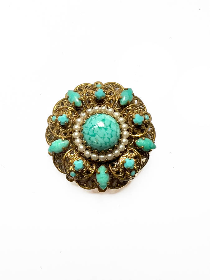 Brooch - Vintage Filigree Turquoise Design with small stones and large stone in the middle surrou...