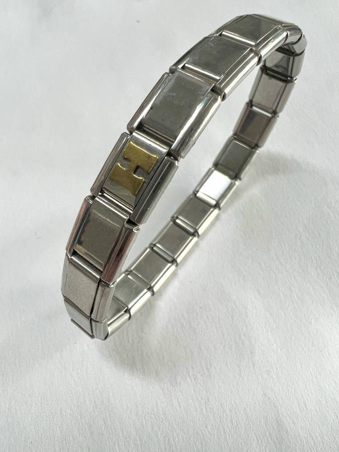 Bracelet - Stainless Steel Nomination Bracelet. One Gold Coloured H Link. (20 Links in total) ML1798