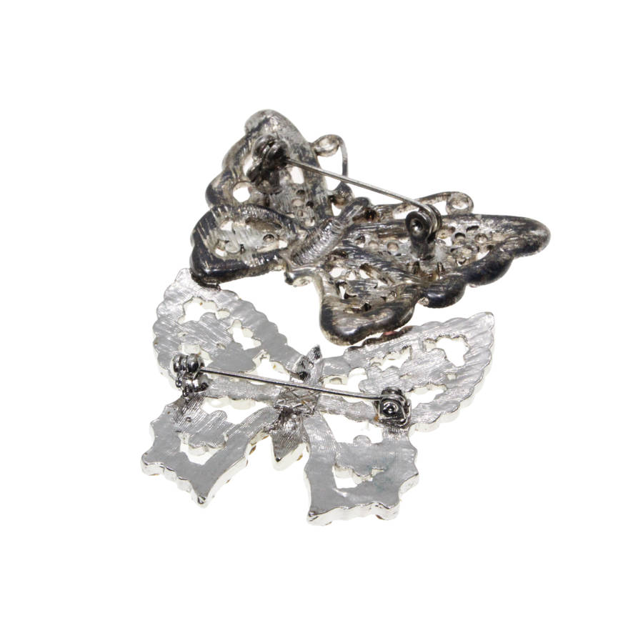 Brooch - Silver Tone. 2 x Diamante Butterfly Brooches.  One Pink One Clear - ML2809
