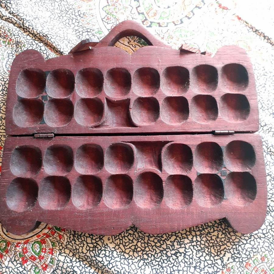 African Ghana Oware wooden board game calculus - Mancala