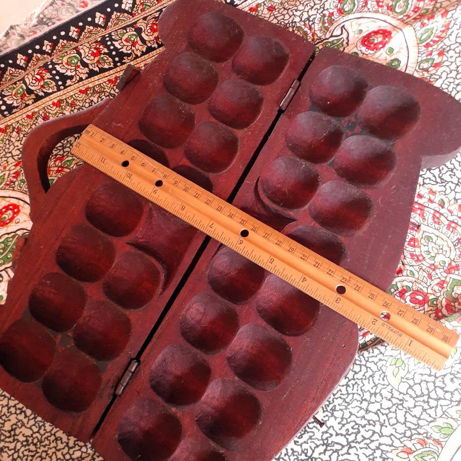 African Ghana Oware wooden board game calculus - Mancala