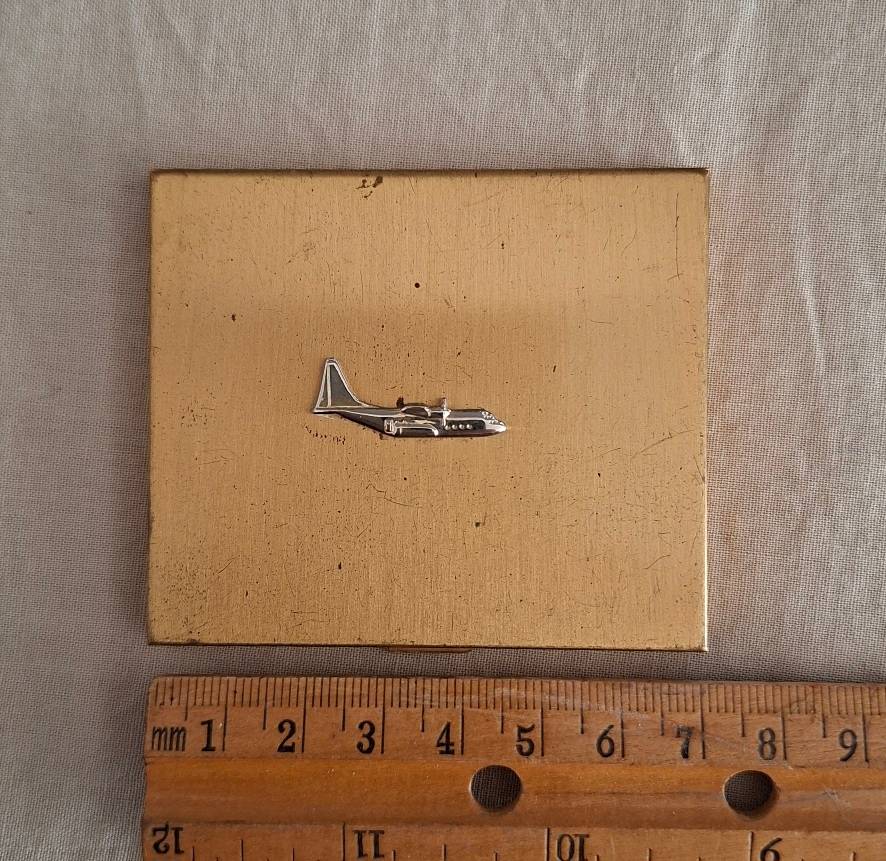 Powder compact - propeller airplane emblem - vintage airways souvenir?