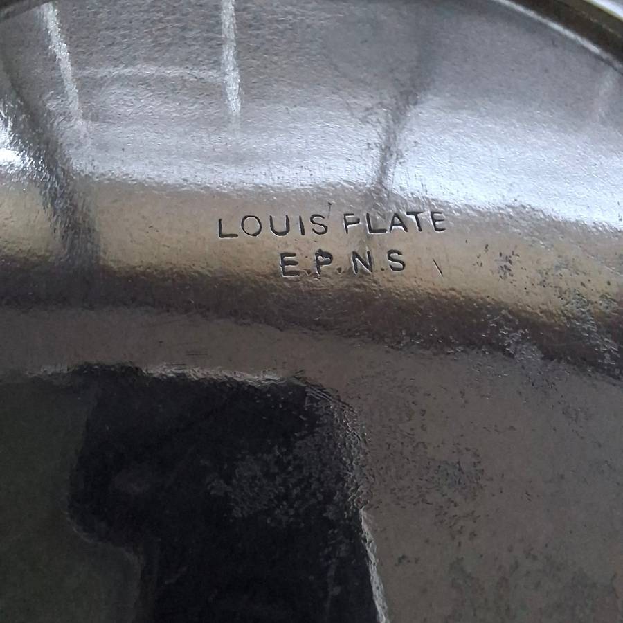Silver plate ice bucket with tongs.   Quality Louis Silver plate with ice water drainer