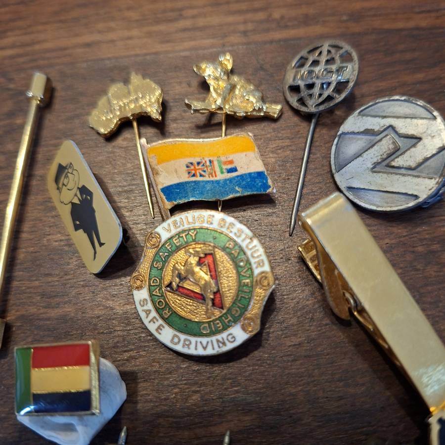 Various pins, enamel, Old SA flag,  SA metal pins. Road safety, and others
