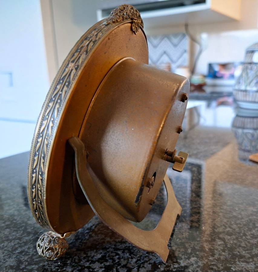 Mechanical Table Clock with petit point face - made in england.  Filigree metal feet.  Working