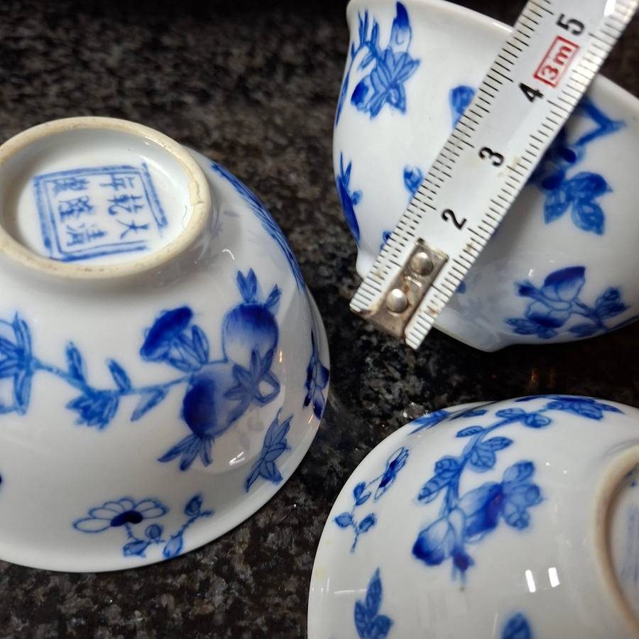 3 Oriental tea bowls - blue and white floral design