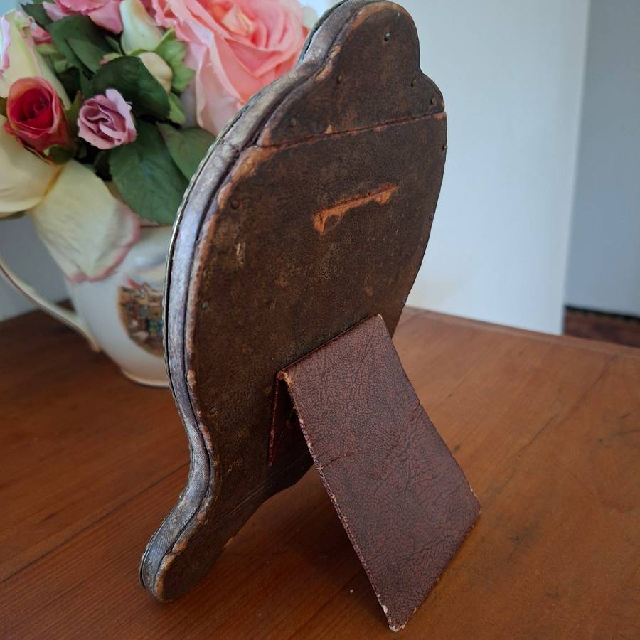 Ornate antique silver plate on brass heart shaped vanity dressing table mirror   14 x 19 cms