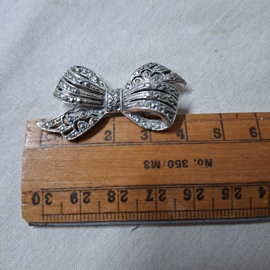 Marcasite bow brooch - impressed mark